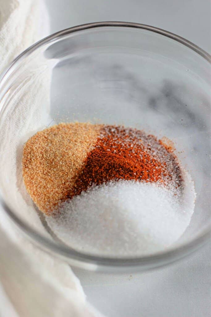 Seasonings in a small glass bowl.