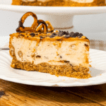 peanut butter cheesecake slice on white plate