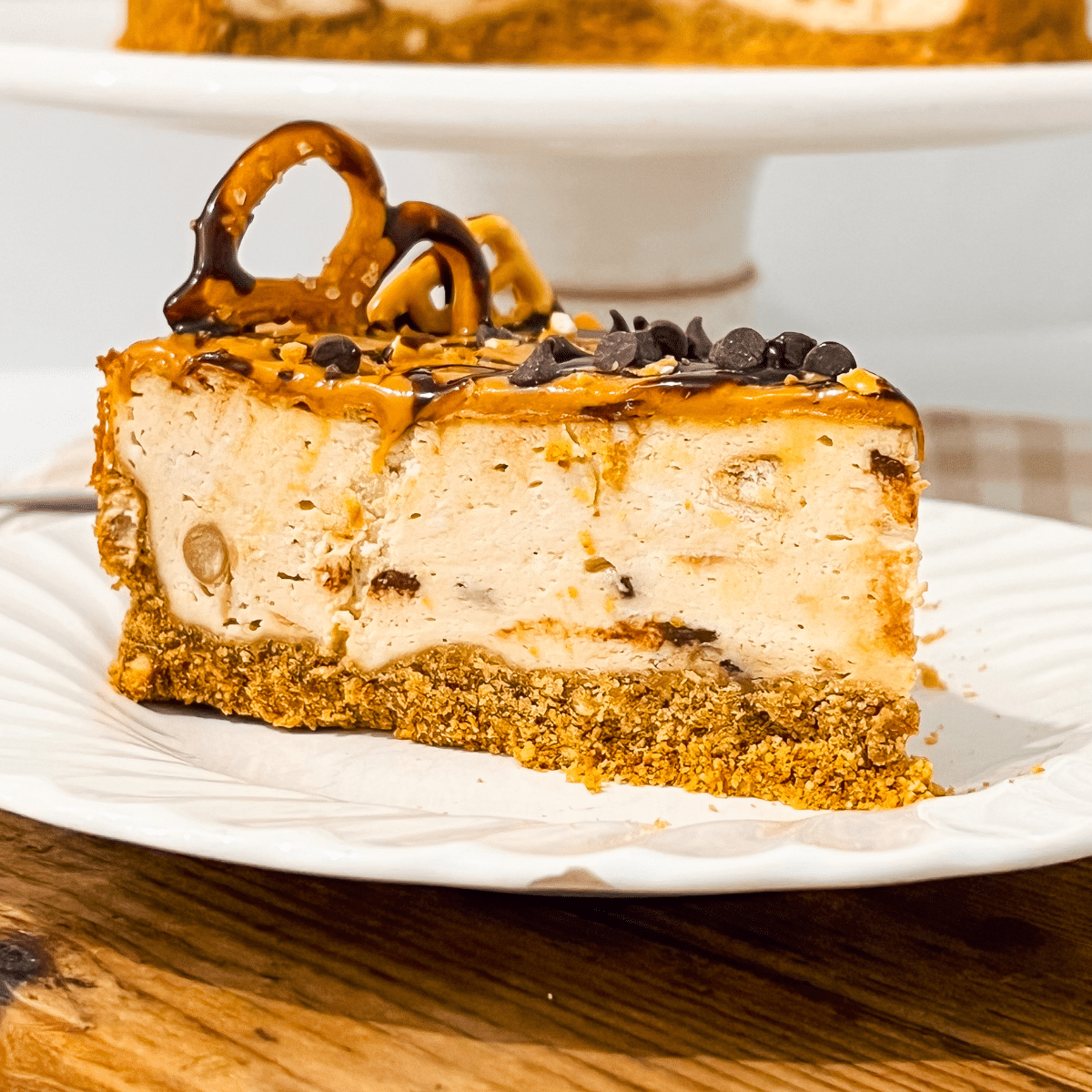 peanut butter cheesecake slice on white plate