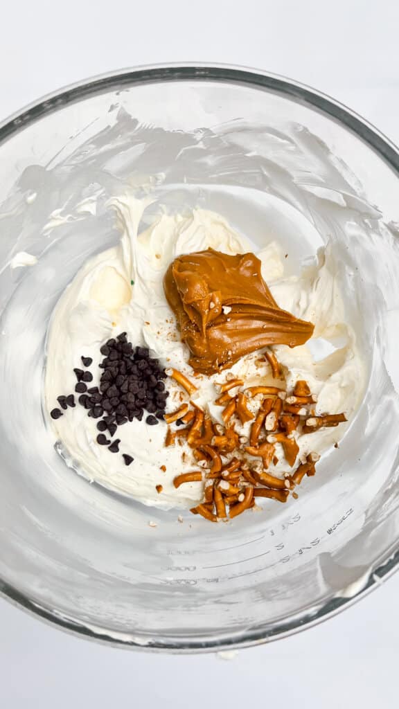 Mixing in the peanut butter and chocolate chips.
