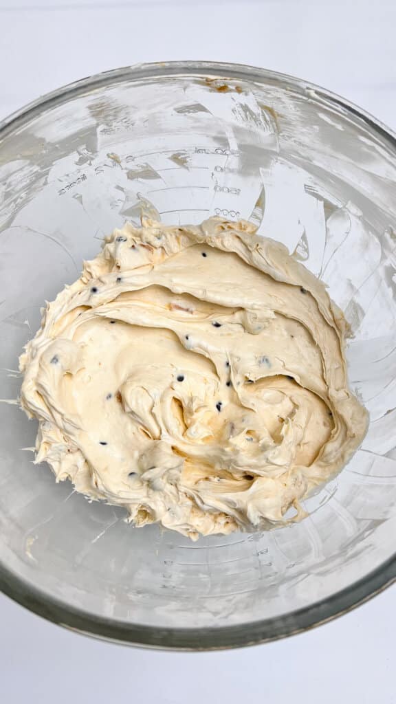 stirring the cheesecake batter until smooth.