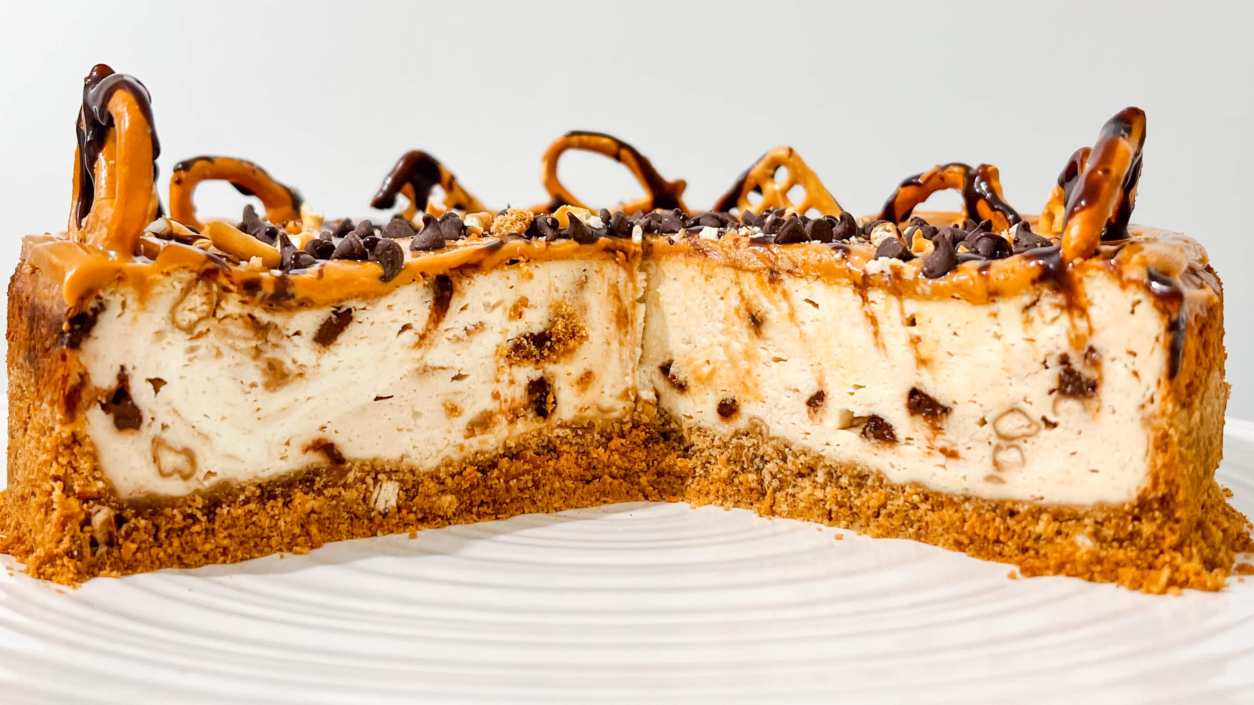 slicing the cheesecake and serving.