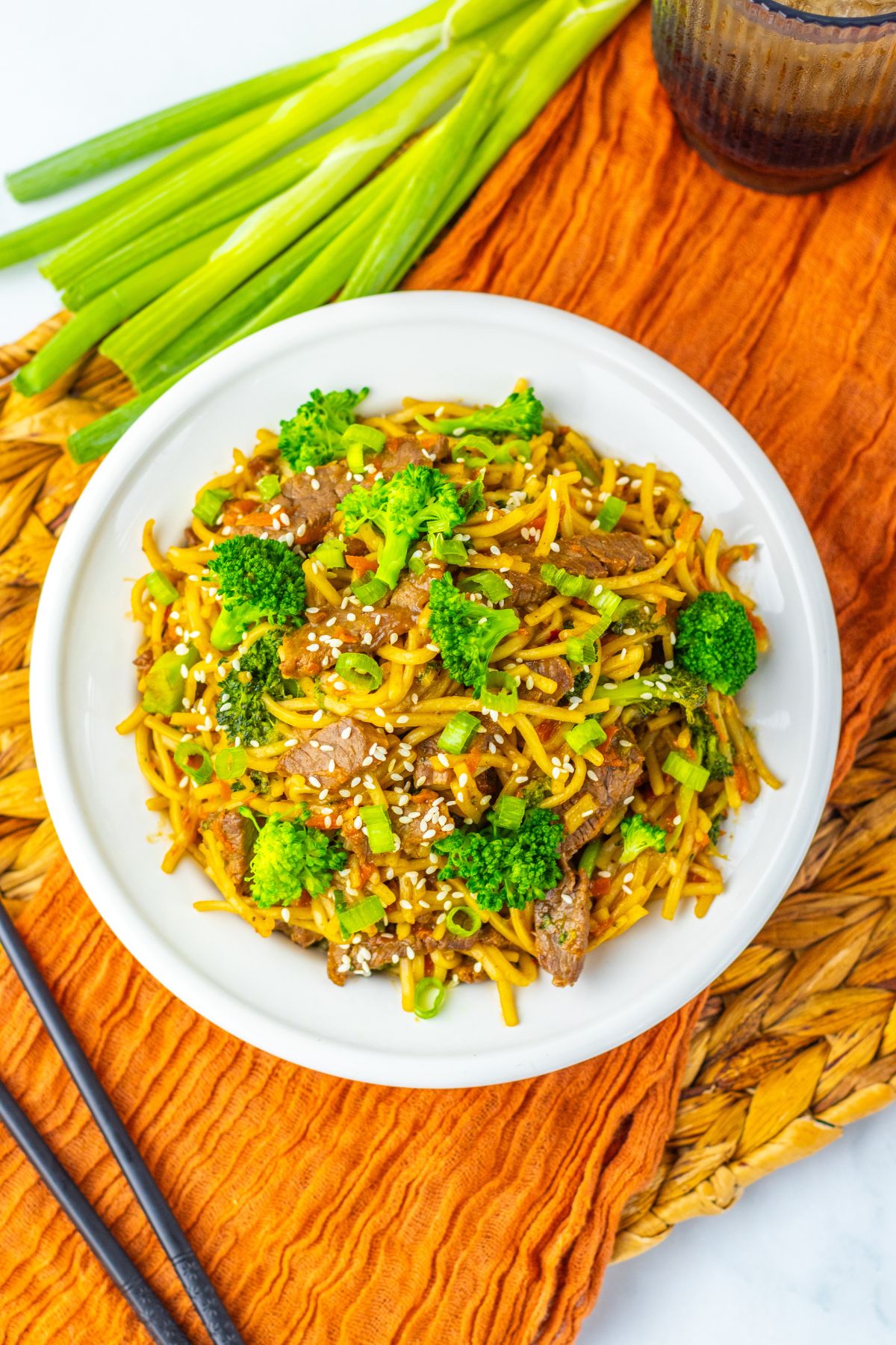 Plate full of beef and broccoli lo mein.