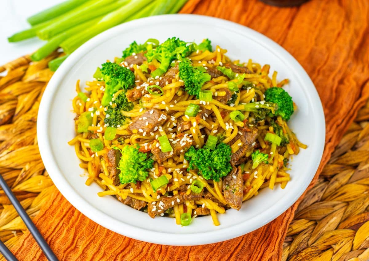 Plate full of beef and broccoli lo mein.