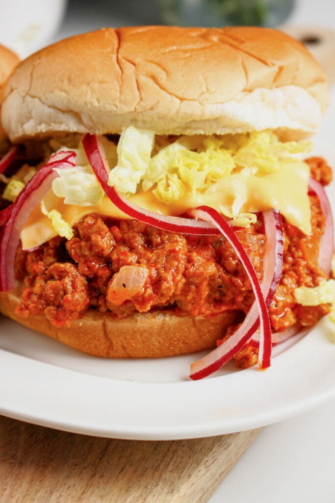 Big mac sloppy joes on a plate.