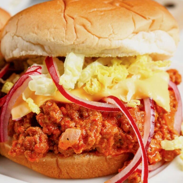 Big mac sloppy joes on a plate.
