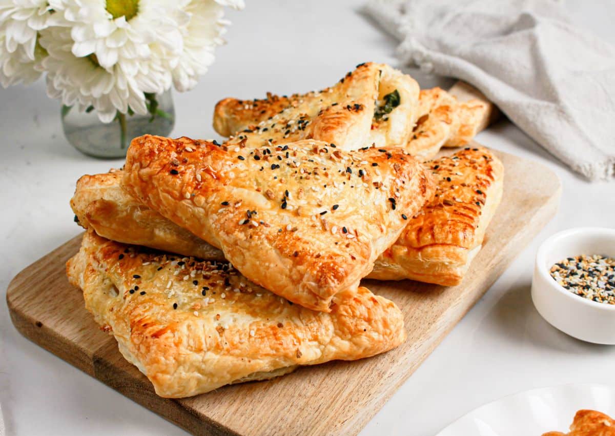 Cheese spinach puff pastries on a plate.