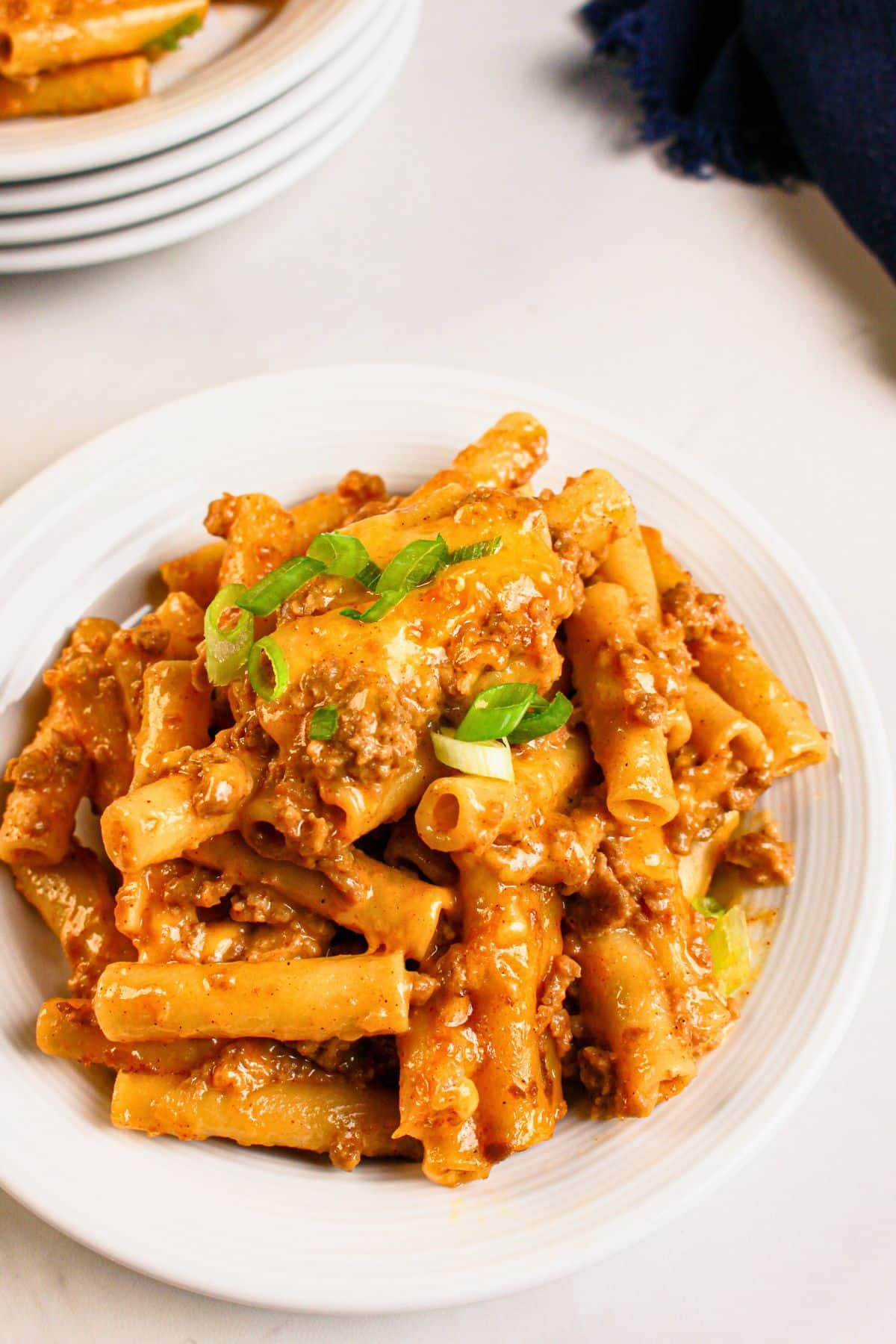 Small plate of cheesy taco pasta bake.