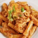 Small plate of cheesy taco pasta bake.