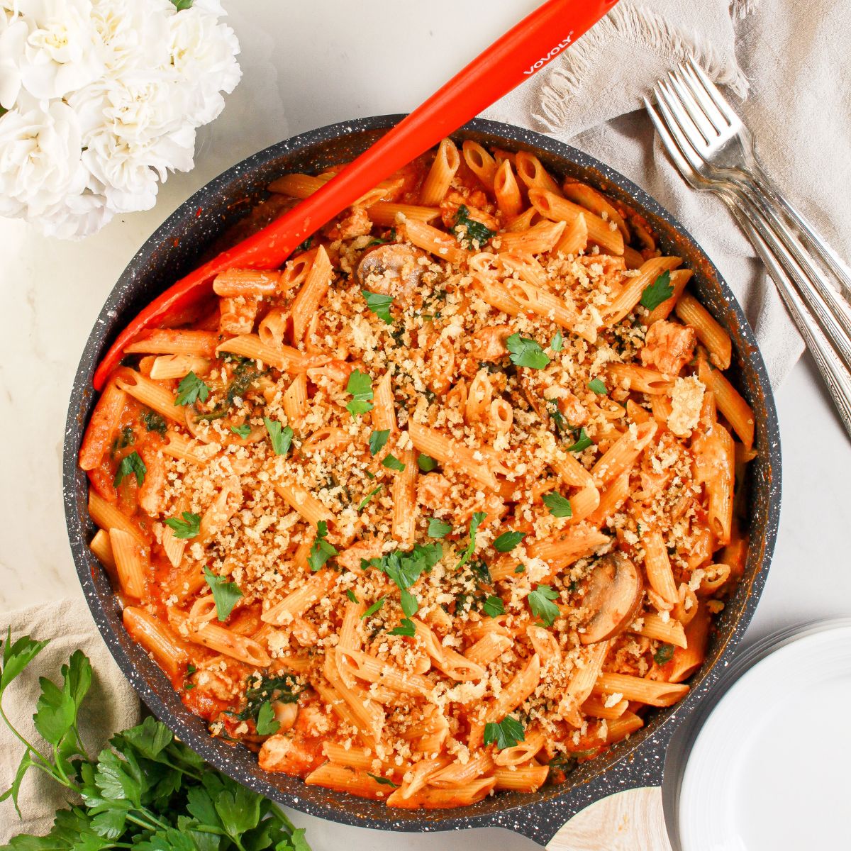 Chicken parmesan pasta skillet in a pan.