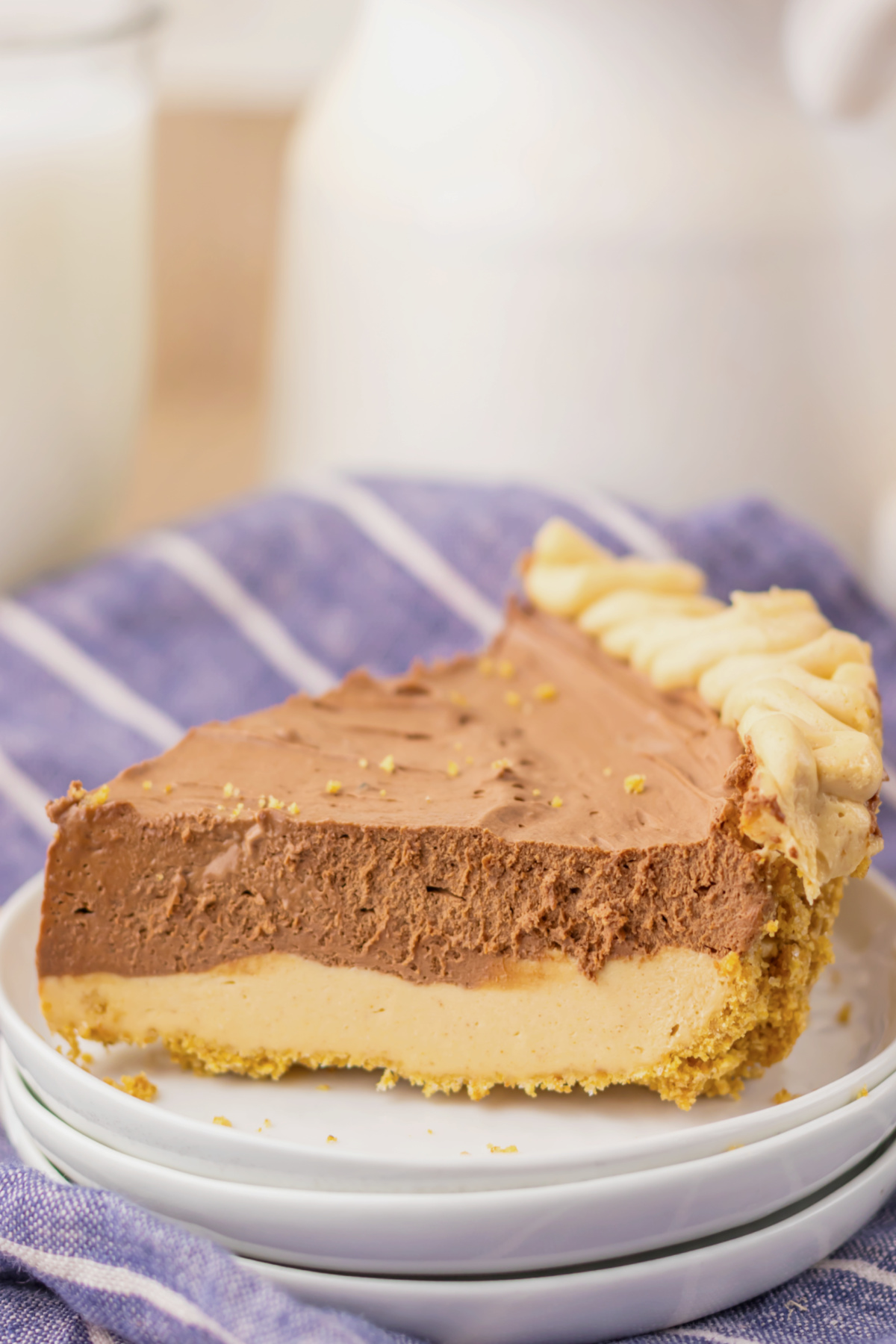 Slice of peanut butter pie on a plate.