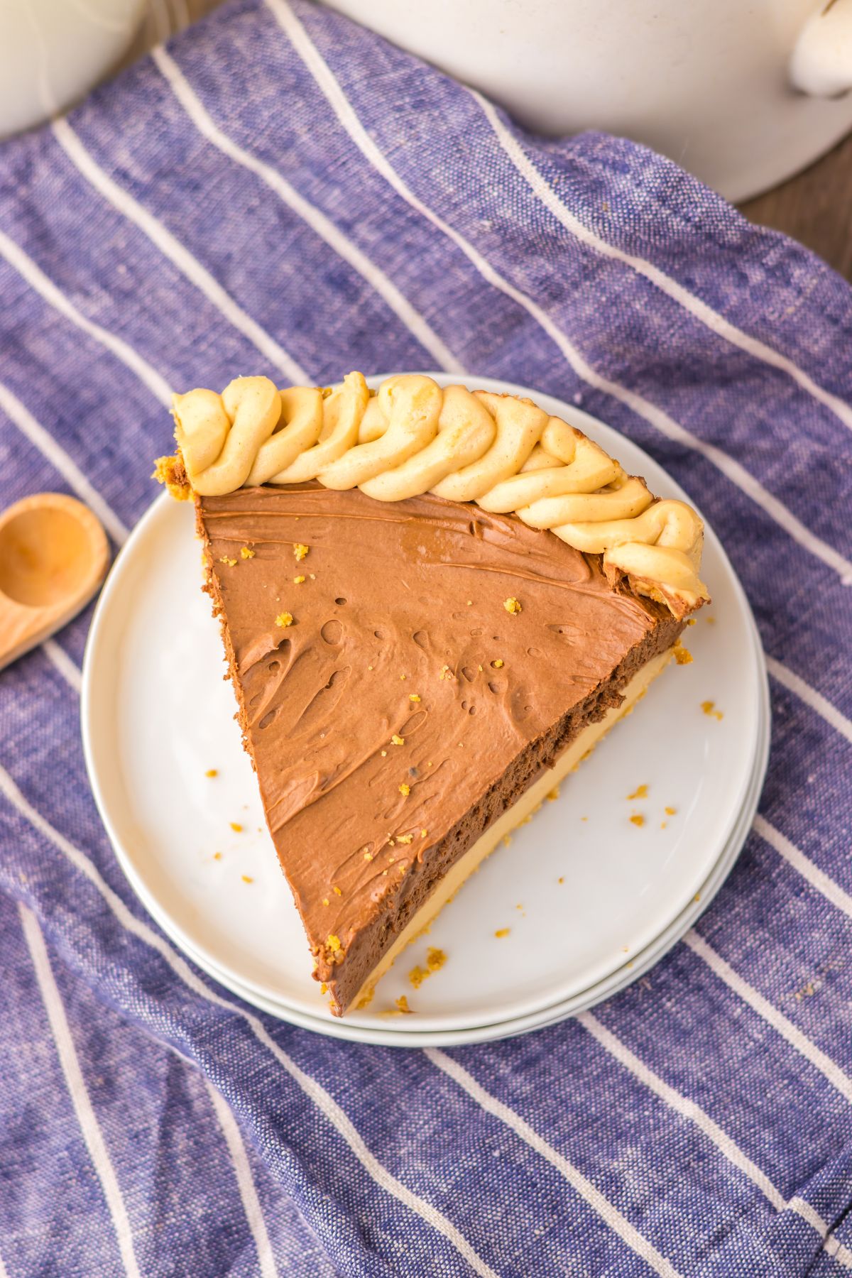 Slice of peanut butter pie on a plate.