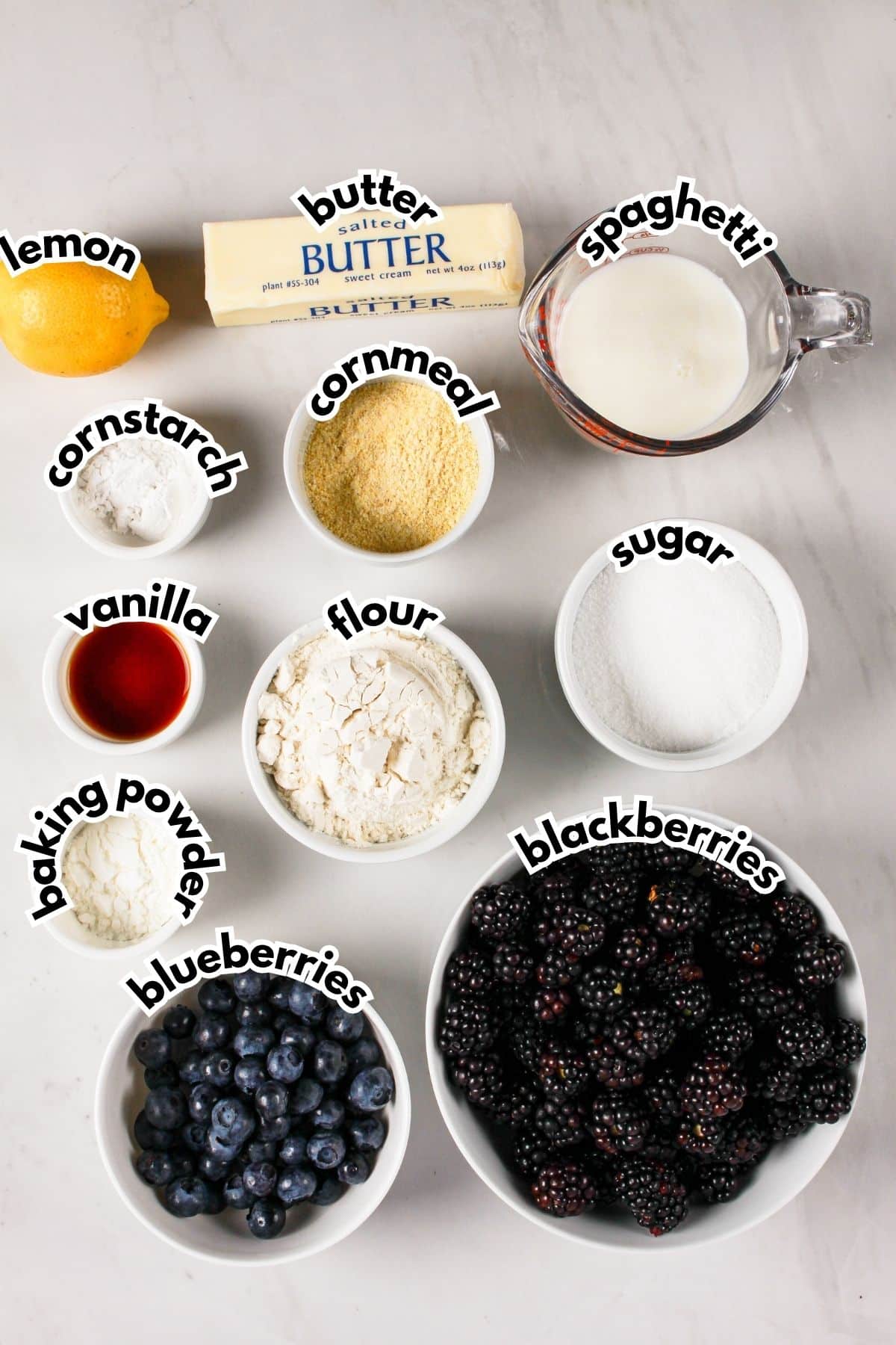 Ingredients on a counter labeled with text.