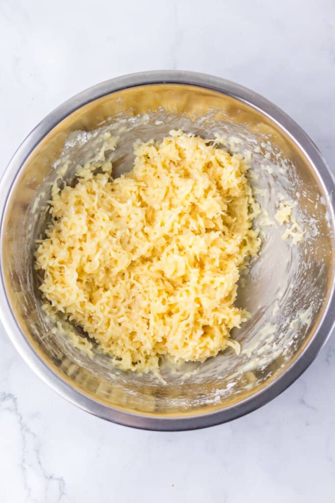 Filling being mixed in a stainless steel bowl.