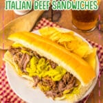 Slow cooker Italian beef sandwich with shredded beef and giardiniera peppers on a hoagie roll.