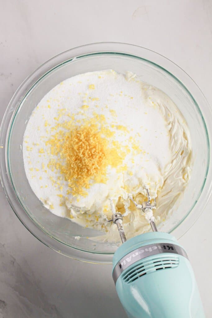 Zest being mixed into batter.