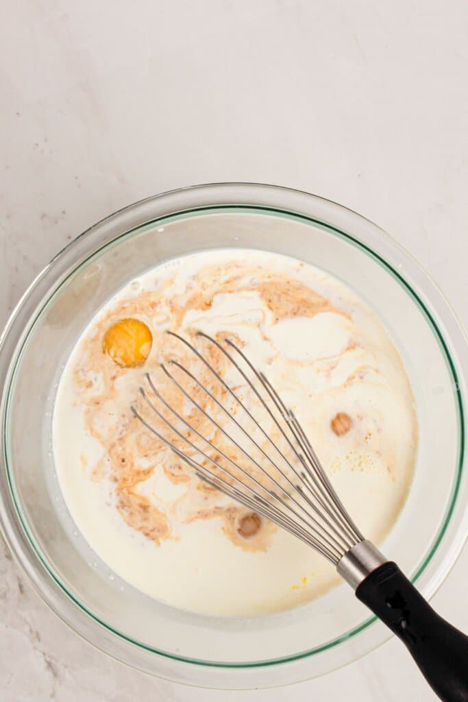 Filling being mixed in a large glass bowl.