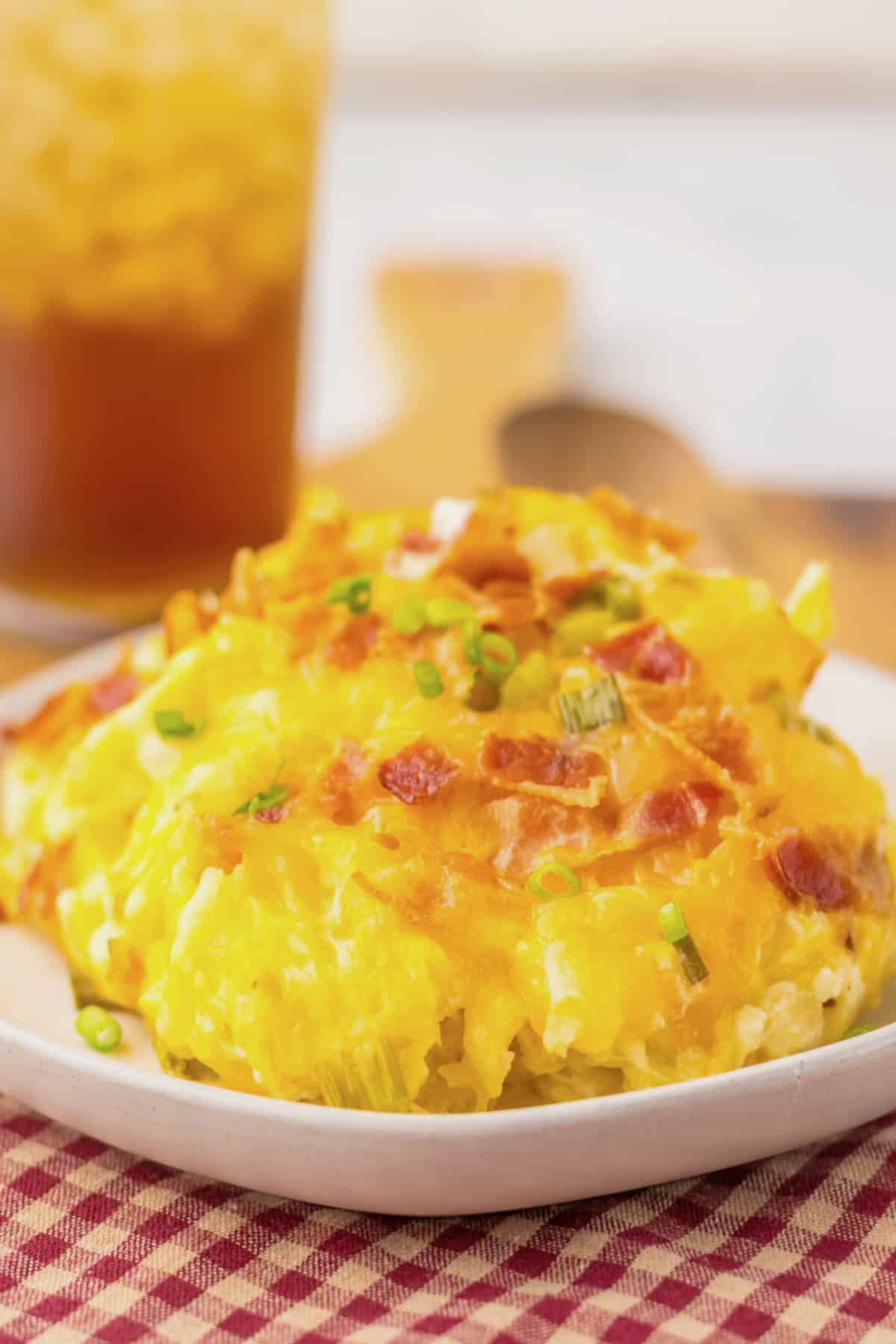 Serving of hashbrown casserole on a plate.