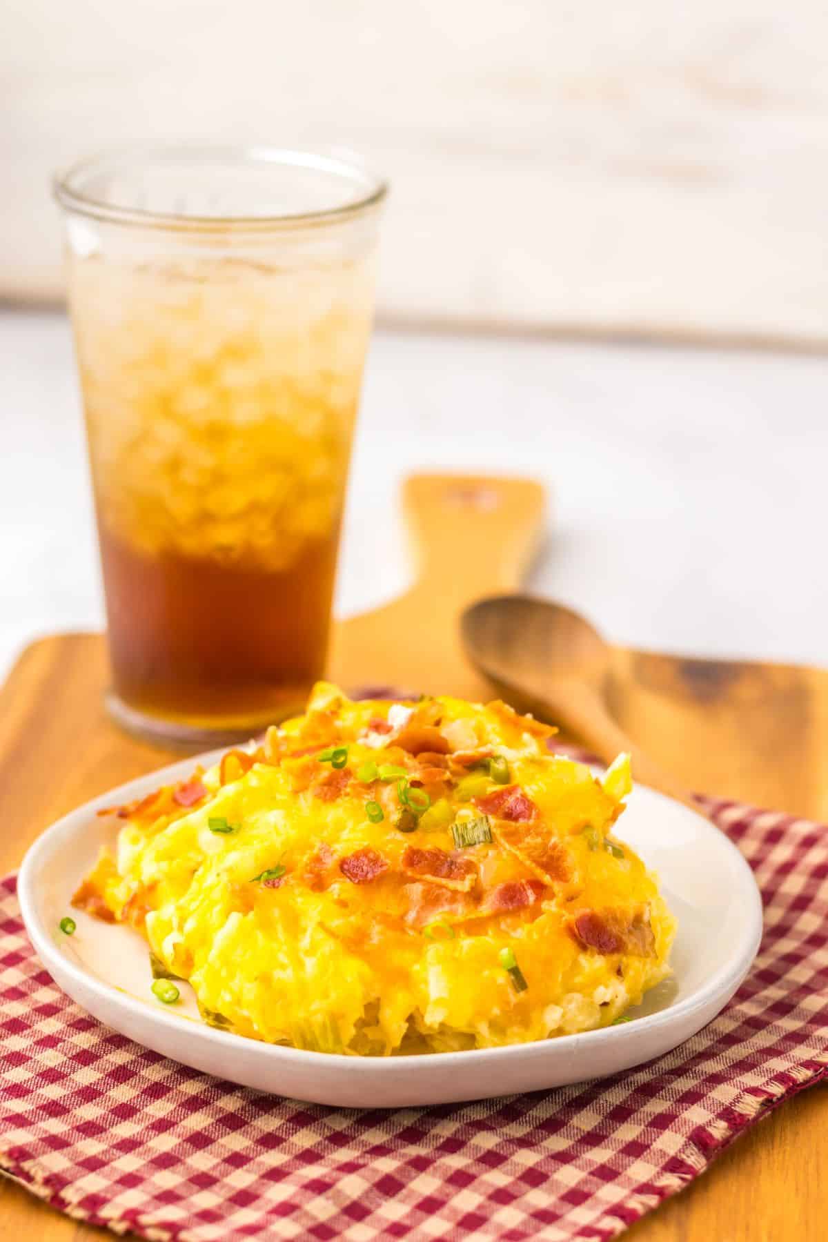 Serving of hashbrown casserole on a plate.