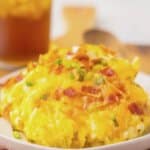 Serving of hashbrown casserole on a plate.