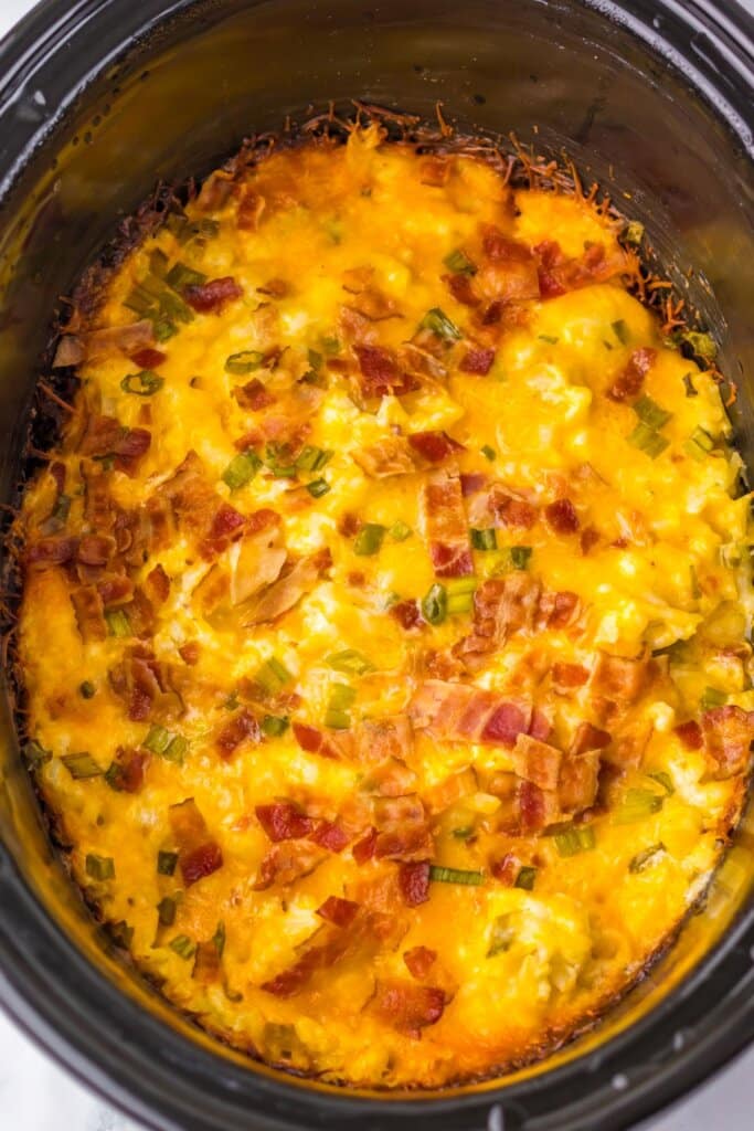 Bacon on top of potatoes.