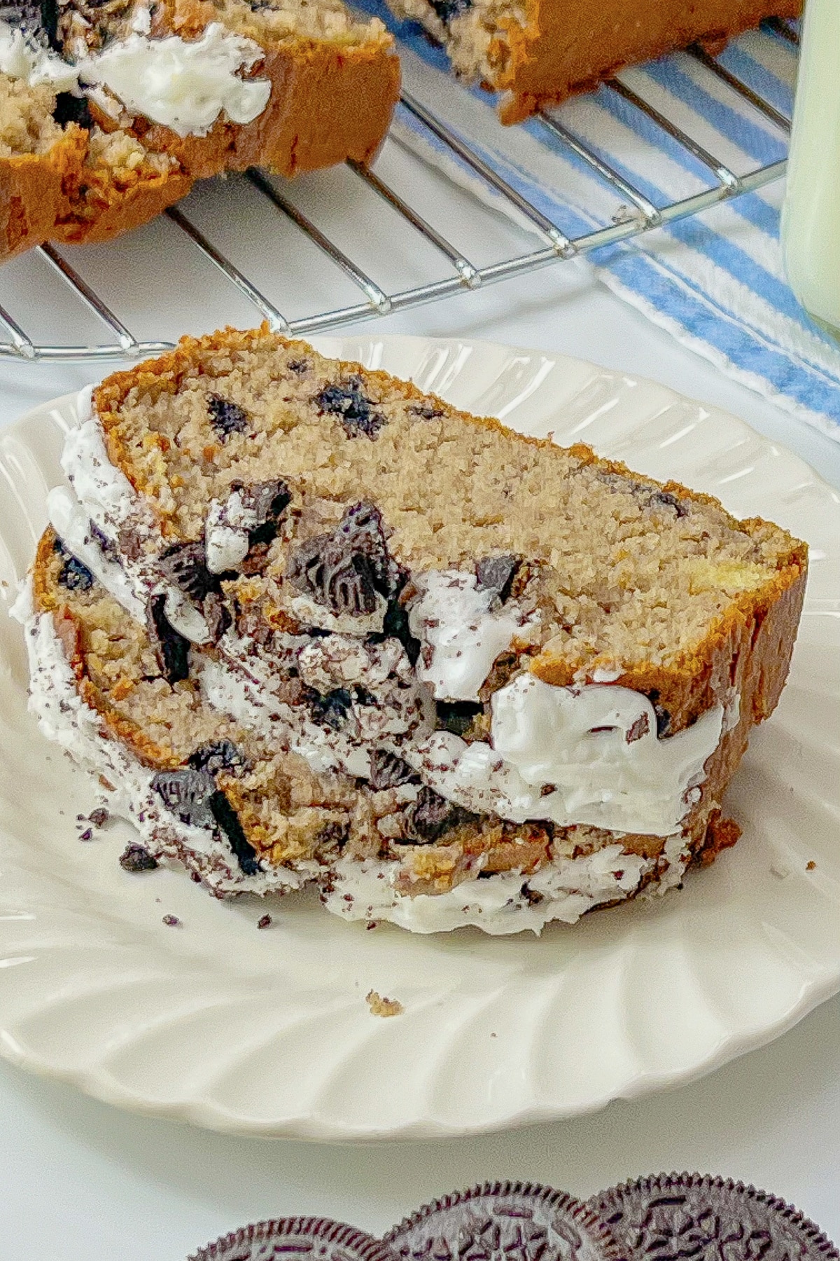 Slices of oreo loaf cake on a small plate.