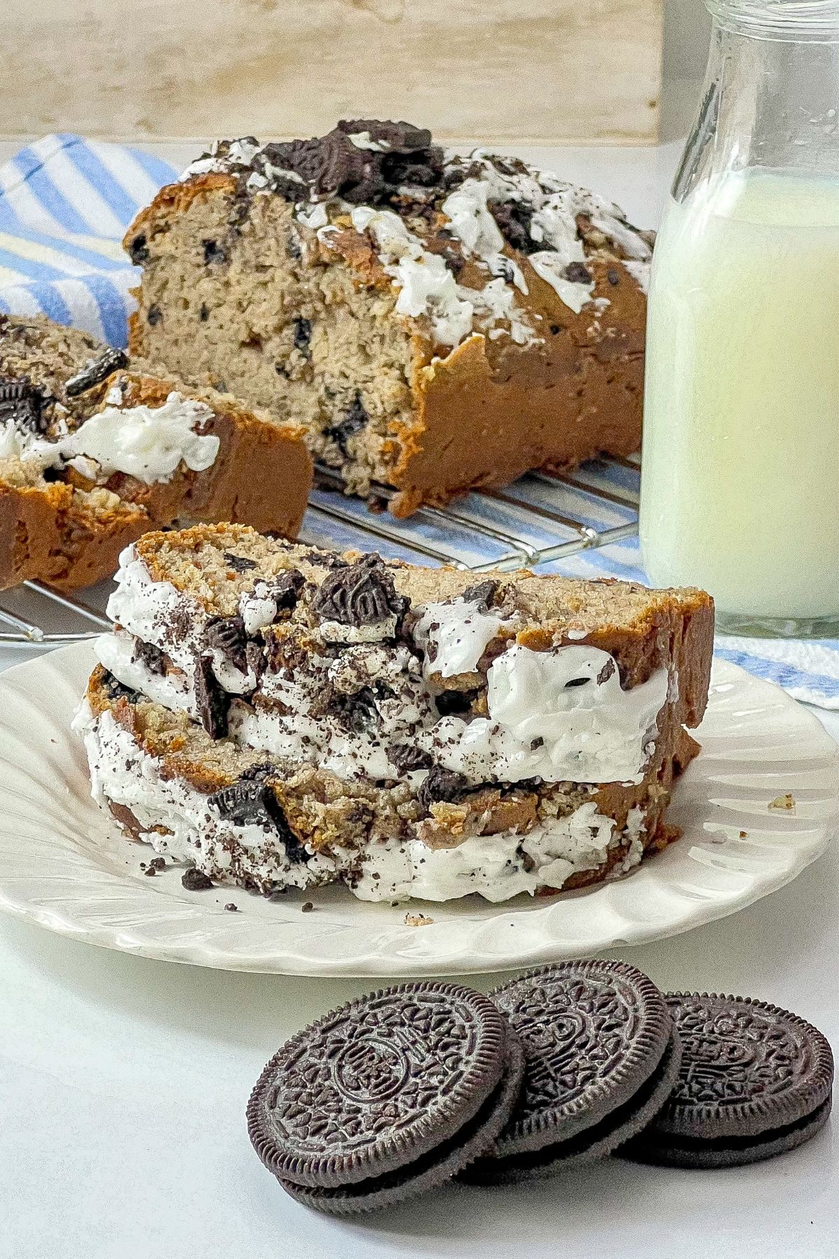 Slices of oreo loaf cake on a small plate.