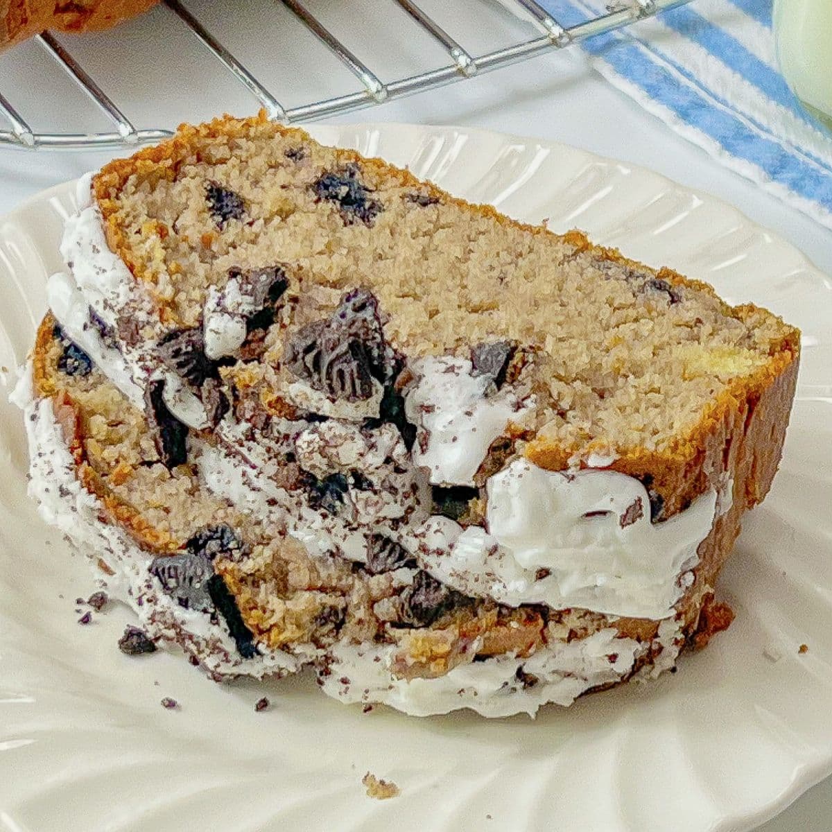 Slices of oreo loaf cake on a small plate.