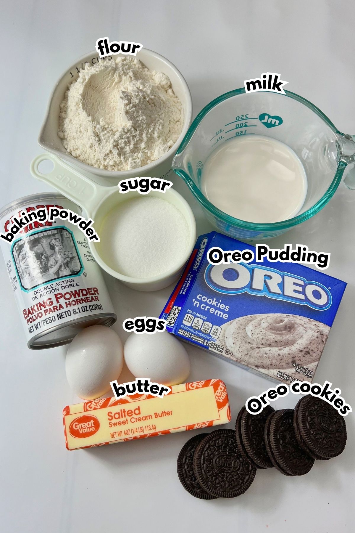 Ingredients on a counter labelled with text.