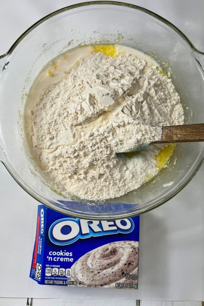 Dry ingredients being mixed into batter.