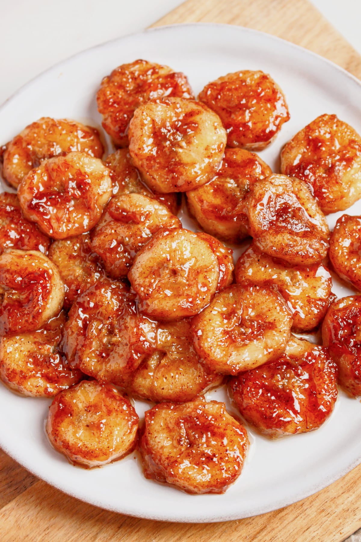 Pan fried bananas on a plate.