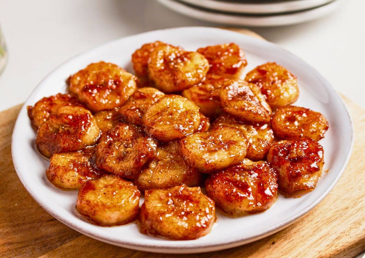 Pan fried bananas on a plate.