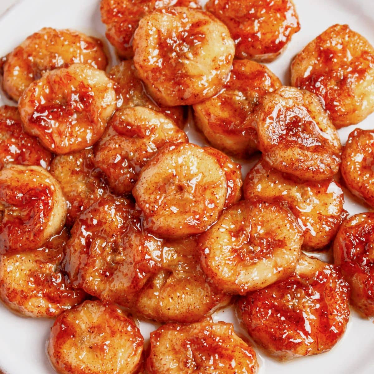 Pan fried bananas on a plate.