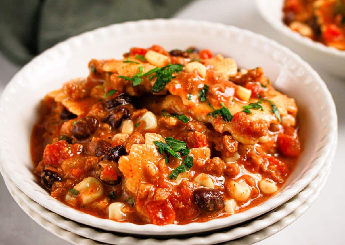 Bowl full of slow cooker taco ravioli.