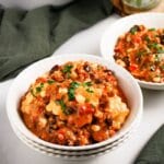 Bowl full of slow cooker taco ravioli.