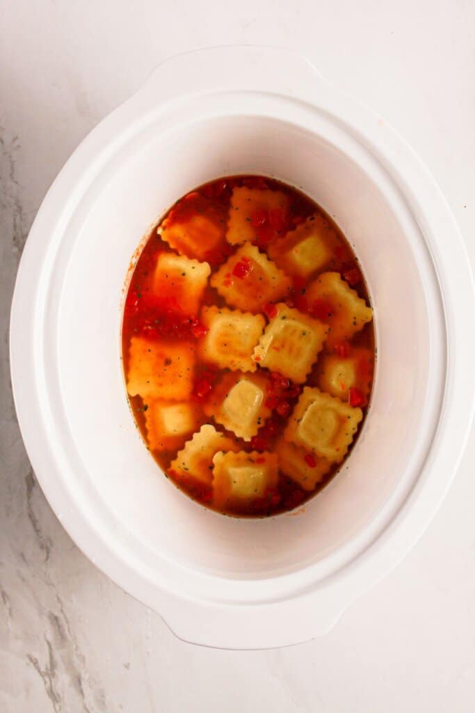 Pasta and sauce in a crockpot.