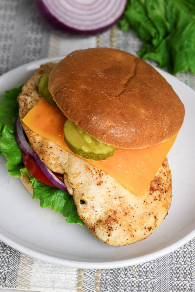 Grilled Chicken Sandwich on a white plate.