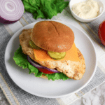 Grilled Chicken Sandwich on a white plate.