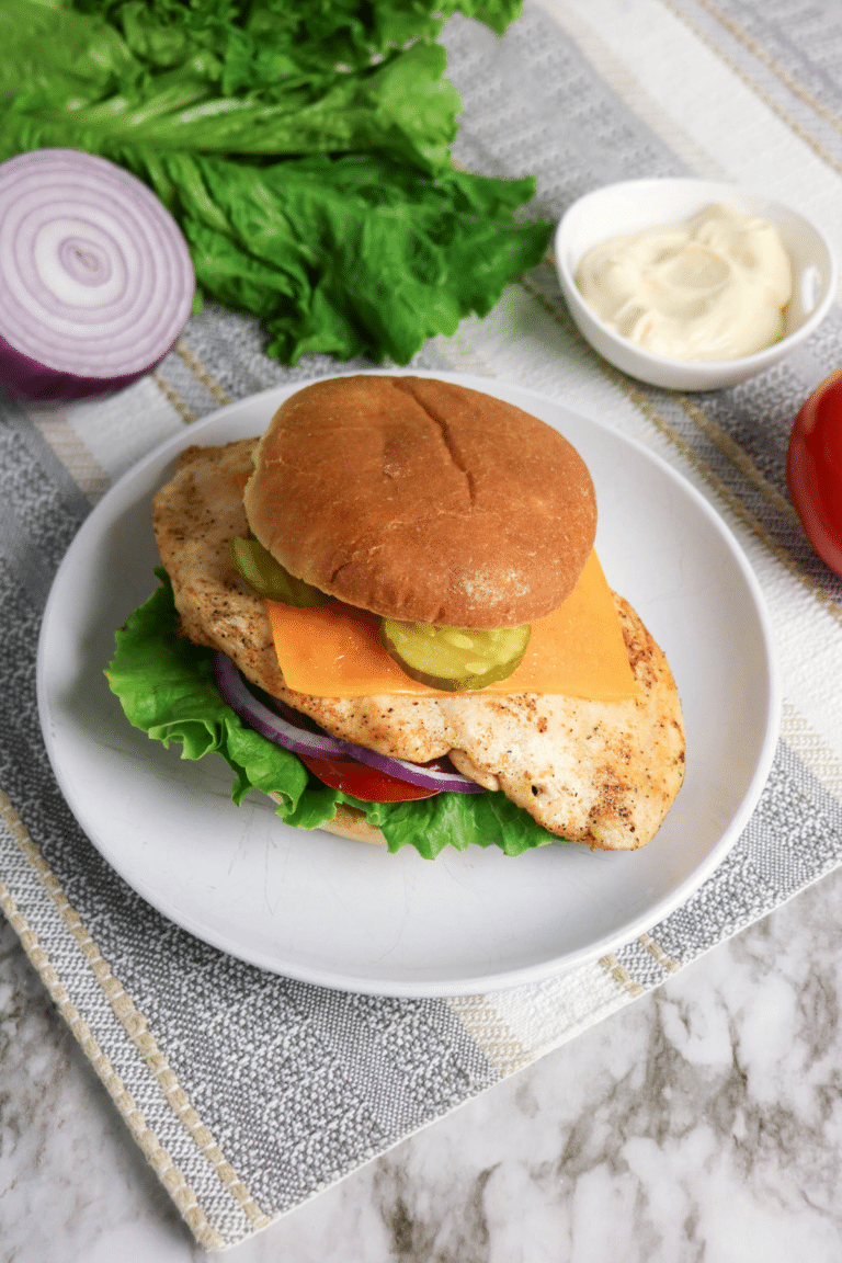 Grilled Chicken Sandwich on a white plate.