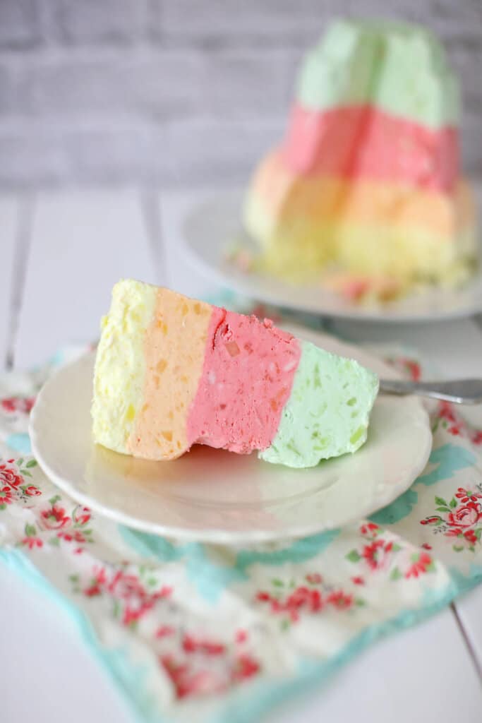 Layered Jello Salad on a white round plate.
