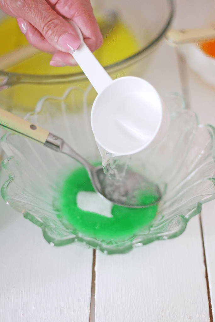 Making the cream jello in a clear bowl.