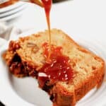 Slice of apple streusel bread on a plate.