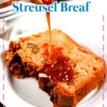 Slice of apple streusel bread on a plate.