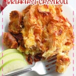Serving of bacon croissant breakfast casserole on a plate.