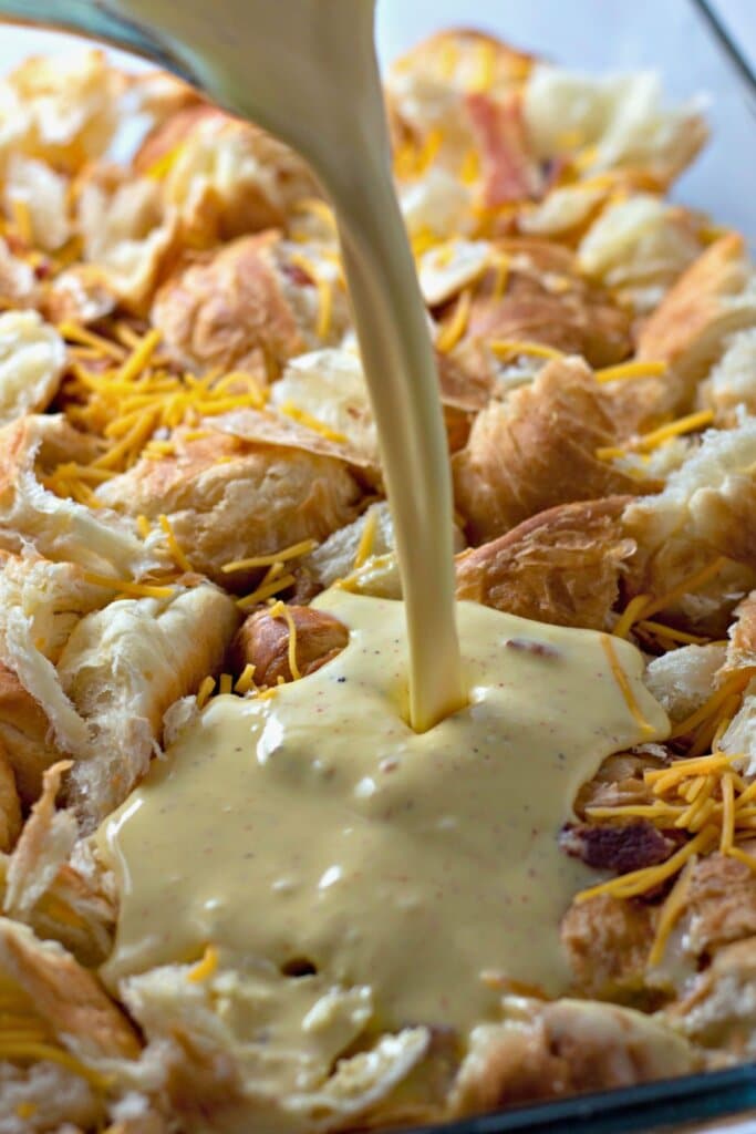 Custard being poured into baking dish.