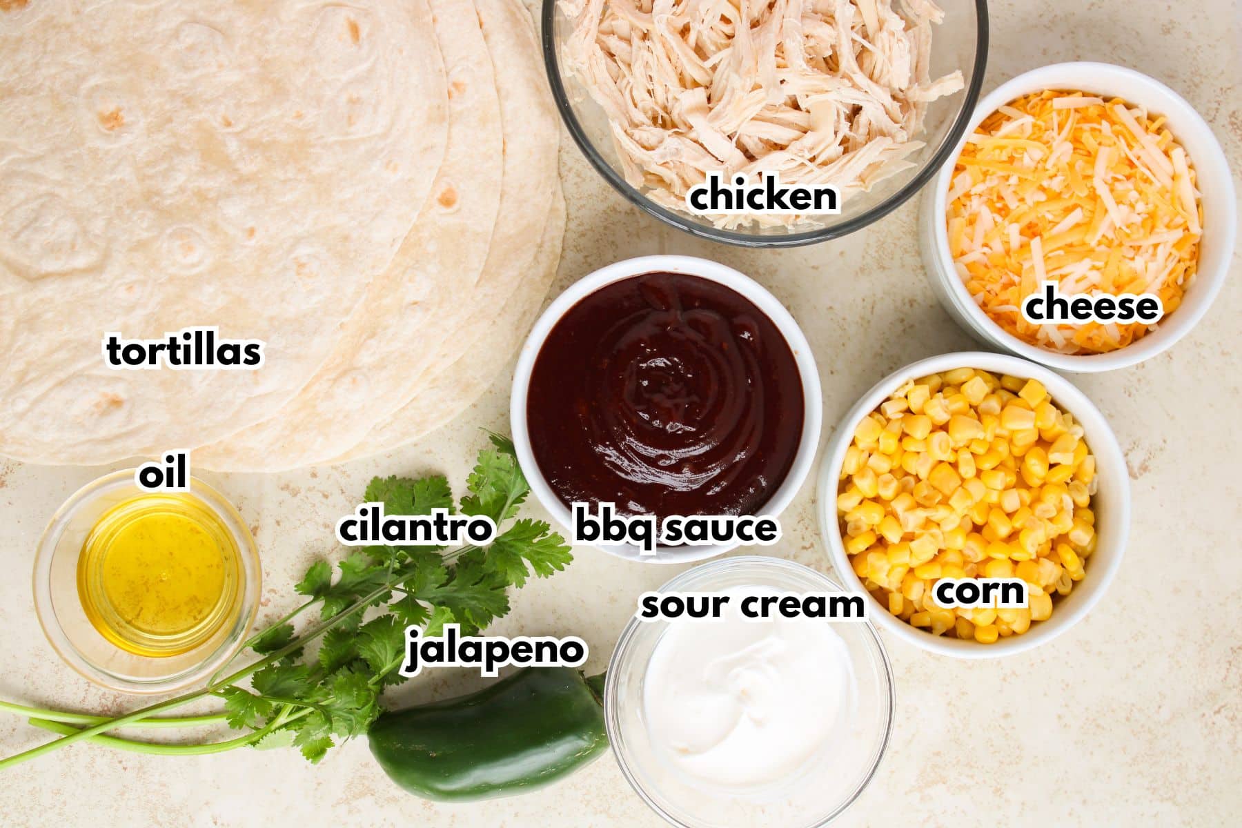 Bowls of ingredients labeled with text.