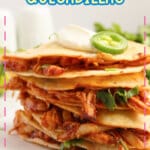 BBQ chicken quesadilla pieces stacked on top of each other.