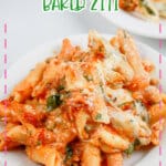 Serving of baked ziti on a small white plate.