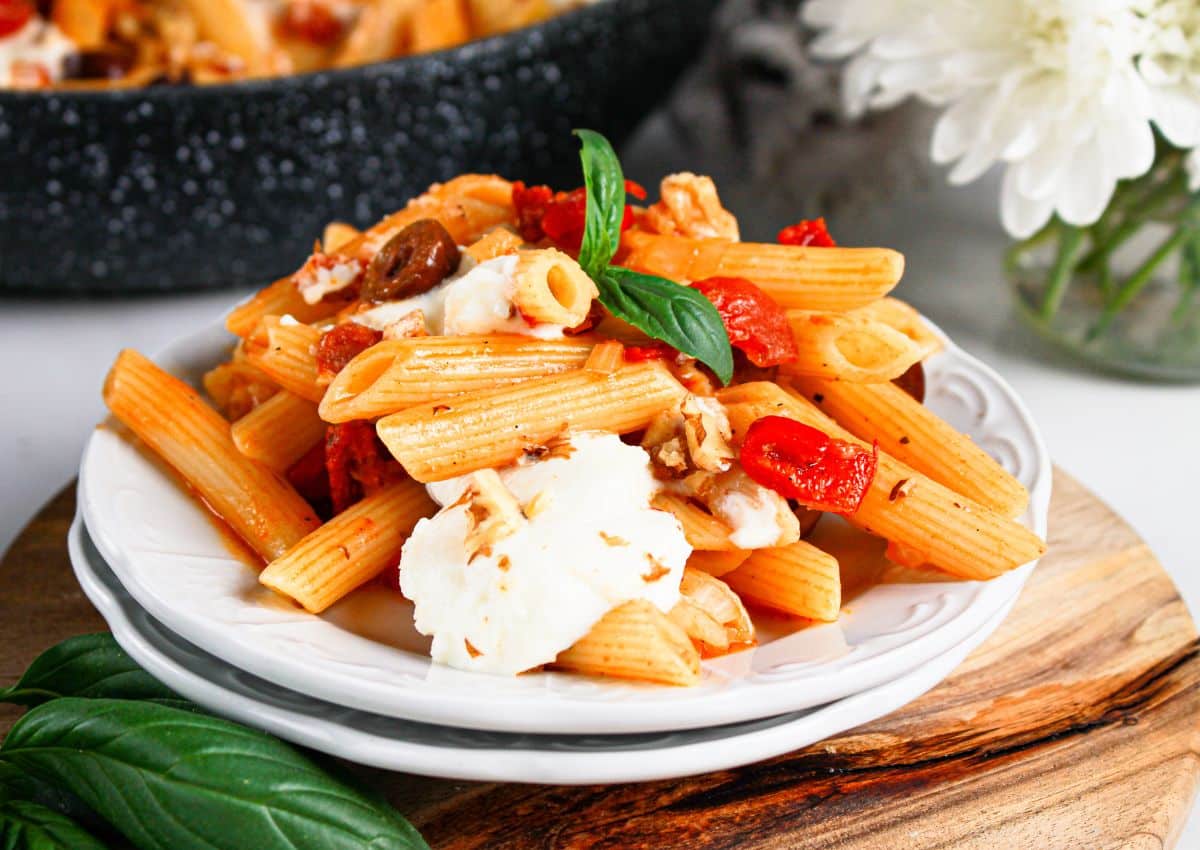 Plate full of penne napoli.