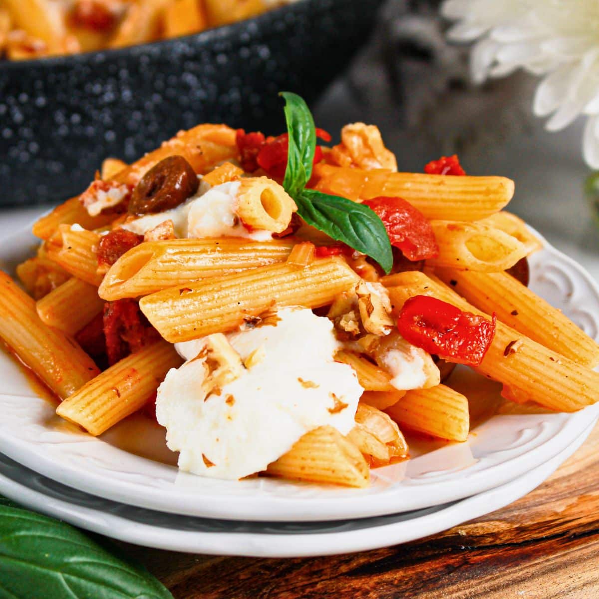 Plate full of penne napoli.